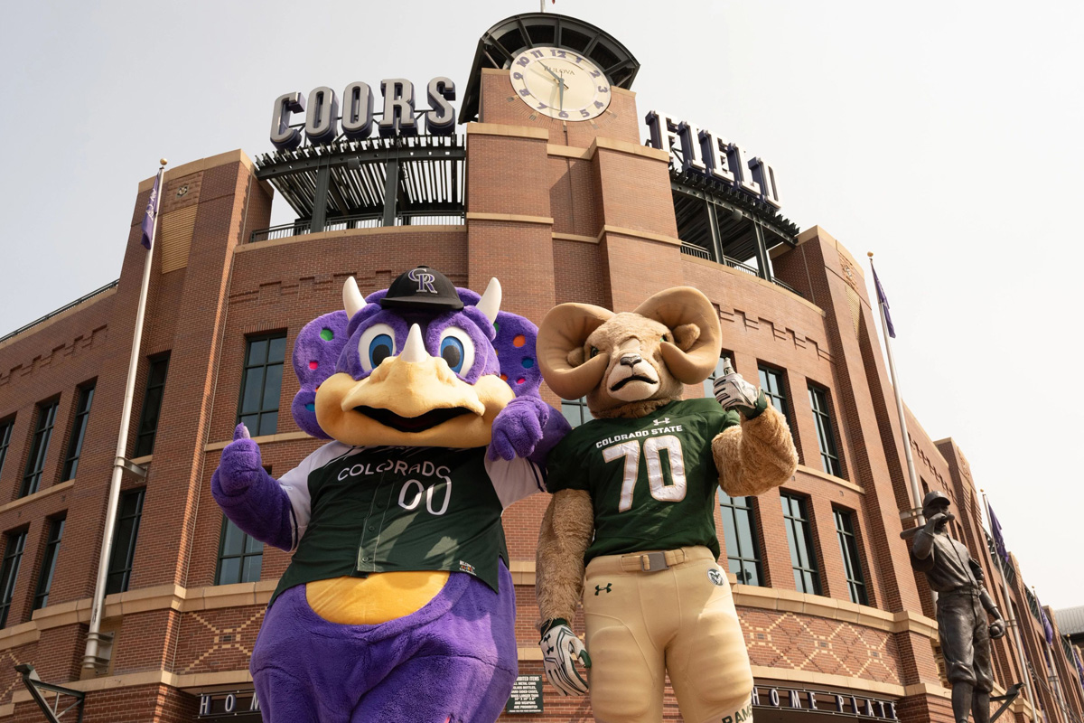 Mascots of Rams and Rockies in front of Coors Field