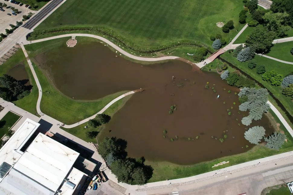 Aerial view of Lagoon containing flood waters on CSU campus July 2023