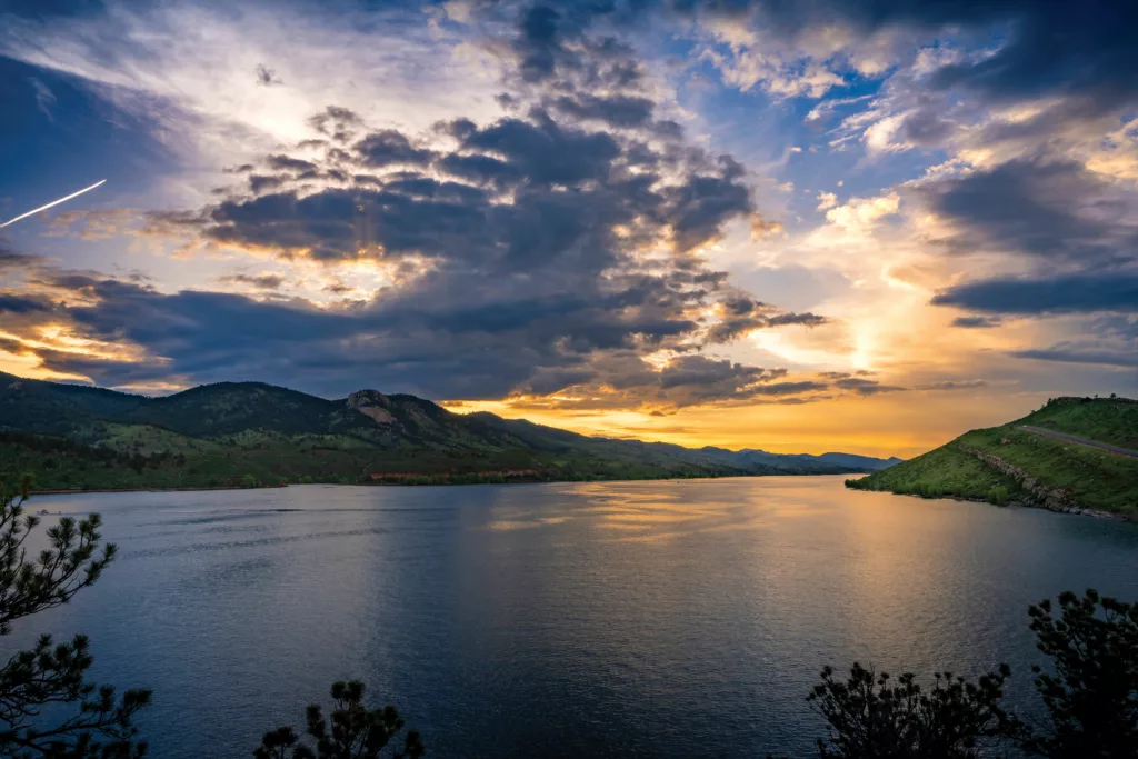 Horsetooth Reservoir sunset in summer with clouds